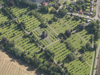 General oblique aerial view of the Western Cemetery, centred on the mortuary chapel, taken from the WNW.