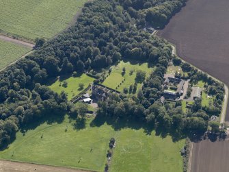 General oblique aerial view of the Gardyne Estate, centred on  Gardyne Castle, taken from the N.
