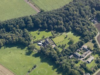 General oblique aerial view of the Gardyne Estate, centred on  Gardyne Castle, taken from the NW.
