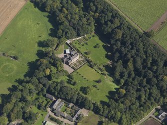 General oblique aerial view of the Gardyne Estate, centred on  Gardyne Castle, taken from the WSW.
