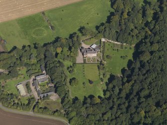 General oblique aerial view of the Gardyne Estate, centred on  Gardyne Castle, taken from the S.