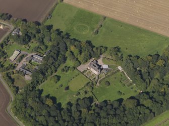 General oblique aerial view of the Gardyne Estate, centred on  Gardyne Castle, taken from the SSE.