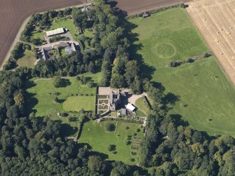 General oblique aerial view of the Gardyne Estate, centred on  Gardyne Castle, taken from the E.
