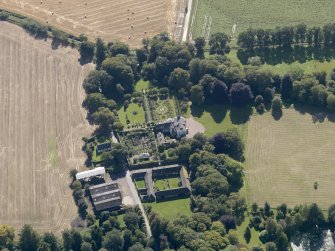 General oblique aerial view of the Pitmuies Estate, centred on  Pitmuies House, taken from the N.