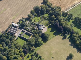 General oblique aerial view of the Pitmuies Estate, centred on  Pitmuies House, taken from the NNW.