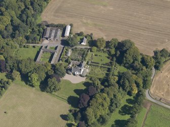 General oblique aerial view of the Pitmuies Estate, centred on  Pitmuies House, taken from the SW.