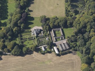 General oblique aerial view of the Pitmuies Estate, centred on  Pitmuies House, taken from the E.