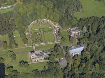 General oblique aerial view of the Guthrie Estate, centred on  Guthrie Castle, taken from the S.