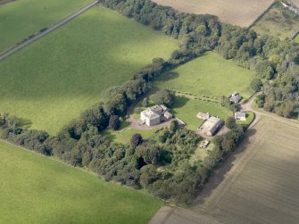 General oblique aerial view of the Usan estate, centred on Usan House, taken from the SE.