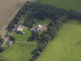 General oblique aerial view of the Usan estate, centred on Usan House, taken from the NW.