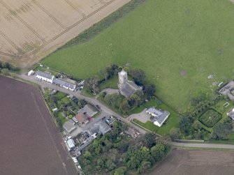 General oblique aerial view of the village of Kirton of Craig, centred on Kirton of Craig Church, taken from the SE.