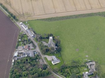 General oblique aerial view of the village of Kirton of Craig, centred on Kirton of Craig Church, taken from the E.