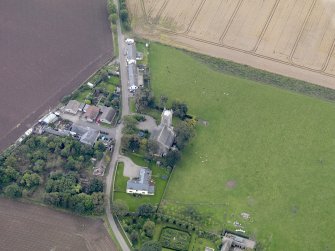 General oblique aerial view of the village of Kirton of Craig, centred on Kirton of Craig Church, taken from the NE.