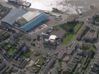 General oblique aerial view of Montrose harbour, West Quay, centred on South Esk Primary School, taken from the NE.