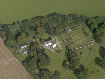 Oblique aerial view of Kinnaber House, taken from the SSW.
