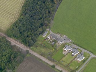 General oblique aerial view of the village of Logie, centred on Logie Church, taken from the SSW.