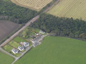 General oblique aerial view of the village of Logie, centred on Logie Church, taken from the E.