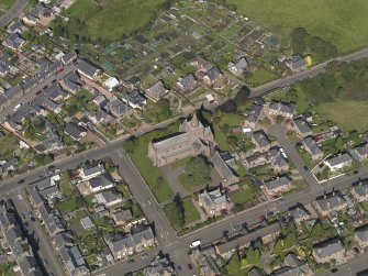 General oblique aerial view of the Montrose Road area of Forfar, centred on Lowson Memorial Church, taken from the SSW.