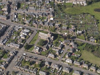 General oblique aerial view of the Montrose Road area of Forfar, centred on Lowson Memorial Church, taken from the SSE.