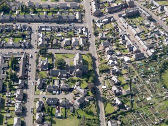 General oblique aerial view of the Montrose Road area of Forfar, centred on Lowson Memorial Church, taken from the E.