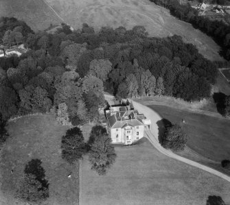 Earlston House, Borgue.  Oblique aerial photograph taken facing north-east.  Prior to its demolition in about 1954.
