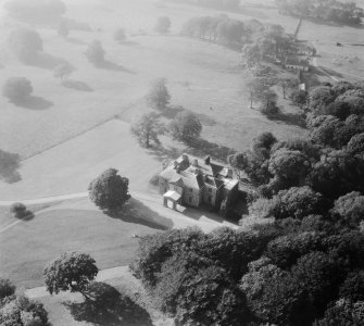 Earlston House, Borgue.  Oblique aerial photograph taken facing west.  Prior to its demolition in about 1954.