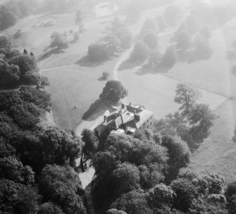 Earlston House, Borgue.  Oblique aerial photograph taken facing south.  Prior to its demolition in about 1954.