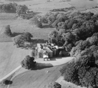 Earlston House, Borgue.  Oblique aerial photograph taken facing north-west.  Prior to its demolition in about 1954.