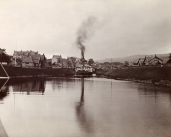 View of a steamer in the Caledonian Canal at Fort Augustus swing bridge, taken from the E.
