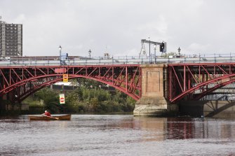 Detail of pier and arches showing one weir partly raised