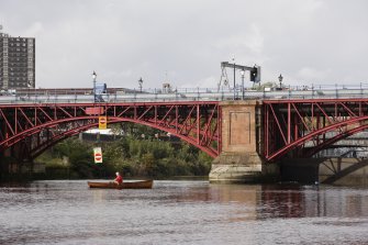 Detail of pier and arches showing one weir partly raised