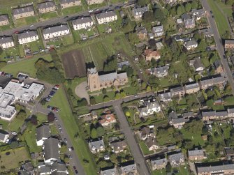 General oblique aerial view of the West Hillbank area of Kirriemiur, centred on St. Mary's Episcopal Church taken from the S.