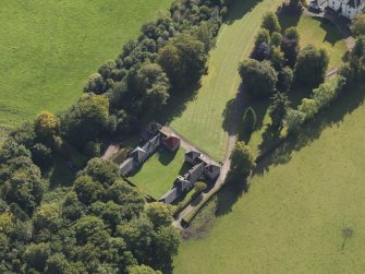 General oblique aerial view of the Downie Park House estate, centred on the stables and farmsteading taken from the NNW.