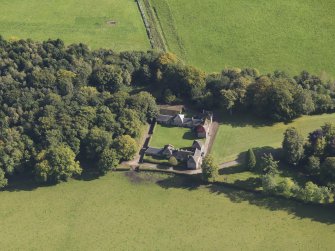 General oblique aerial view of the Downie Park House estate, centred on the stables and farmsteading taken from the W.