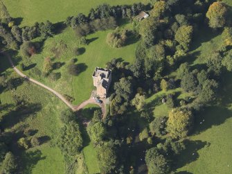 Oblique aerial view of Inverqharity Castle taken from the SE.