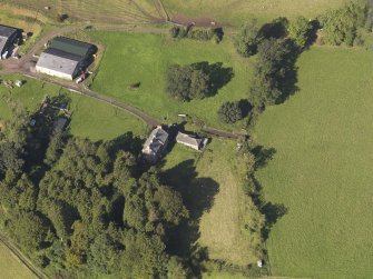 General oblique aerial view of Baldovie Farm, centred on Baldovie farmhouse taken from the SE.
