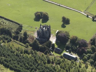 General oblique aerial view  of Balintore Castle Estate, centred on Balintore Castle, taken from the NNW.