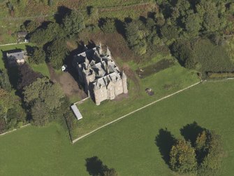 General oblique aerial view  of Balintore Castle Estate, centred on Balintore Castle, taken from the SSW.