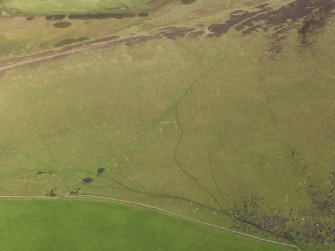 General oblique aerial view  of Strone Hill, centred on the remains of the field system and township taken from the SSW.