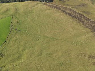 General oblique aerial view  of Strone Hill, centred on the remains of the field system and township, taken from the SE.