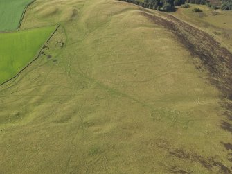 General oblique aerial view  of Strone Hill, centred on the remains of the field system and township, taken from the ENE.