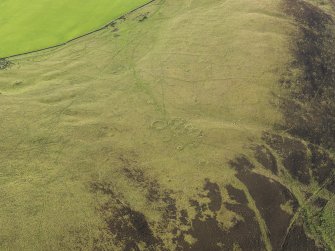 General oblique aerial view  of Strone Hill, centred on the remains of the field system and township, taken from the NE.