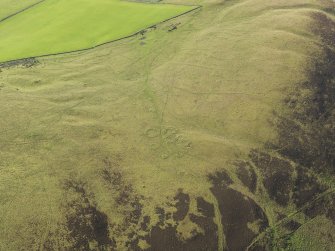 General oblique aerial view  of Strone Hill, centred on the remains of the field system and township, taken from the NNE.