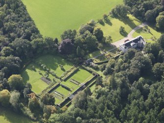 General oblique aerial view of Balnamoon House estate, centred on Balnamoon House, taken from the NE.