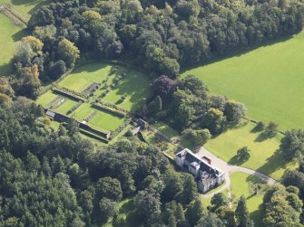 General oblique aerial view of Balnamoon House estate, centred on Balnamoon House, taken from the NW.