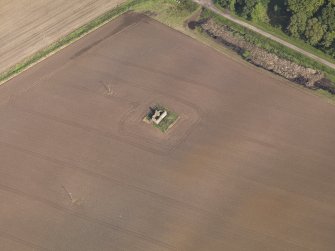 Oblique aerial view of  dovecot at Balnamoon House, taken from the SW.