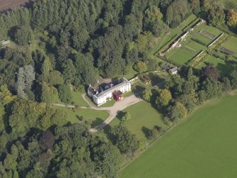 General oblique aerial view of Balnamoon House estate, centred on Balnamoon House, taken from the WSW.