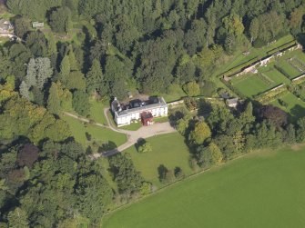General oblique aerial view of Balnamoon House estate, centred on Balnamoon House, taken from the SSW.