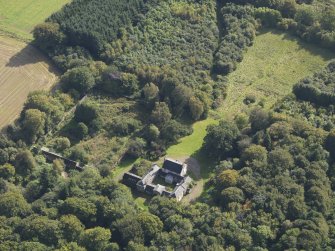 General oblique aerial view of Kintrockat House estate, centred on Kintrockat House, taken from the NW.