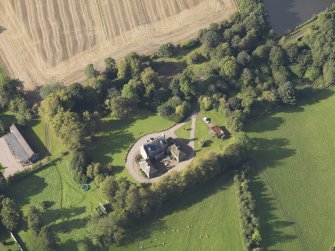 General oblique aerial view of Ardovie House estate, centred on  Ardovie House, taken from the SE.